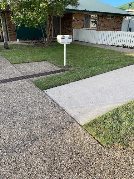 Rental property garden and lawn tidied before inspection at Regency Downs