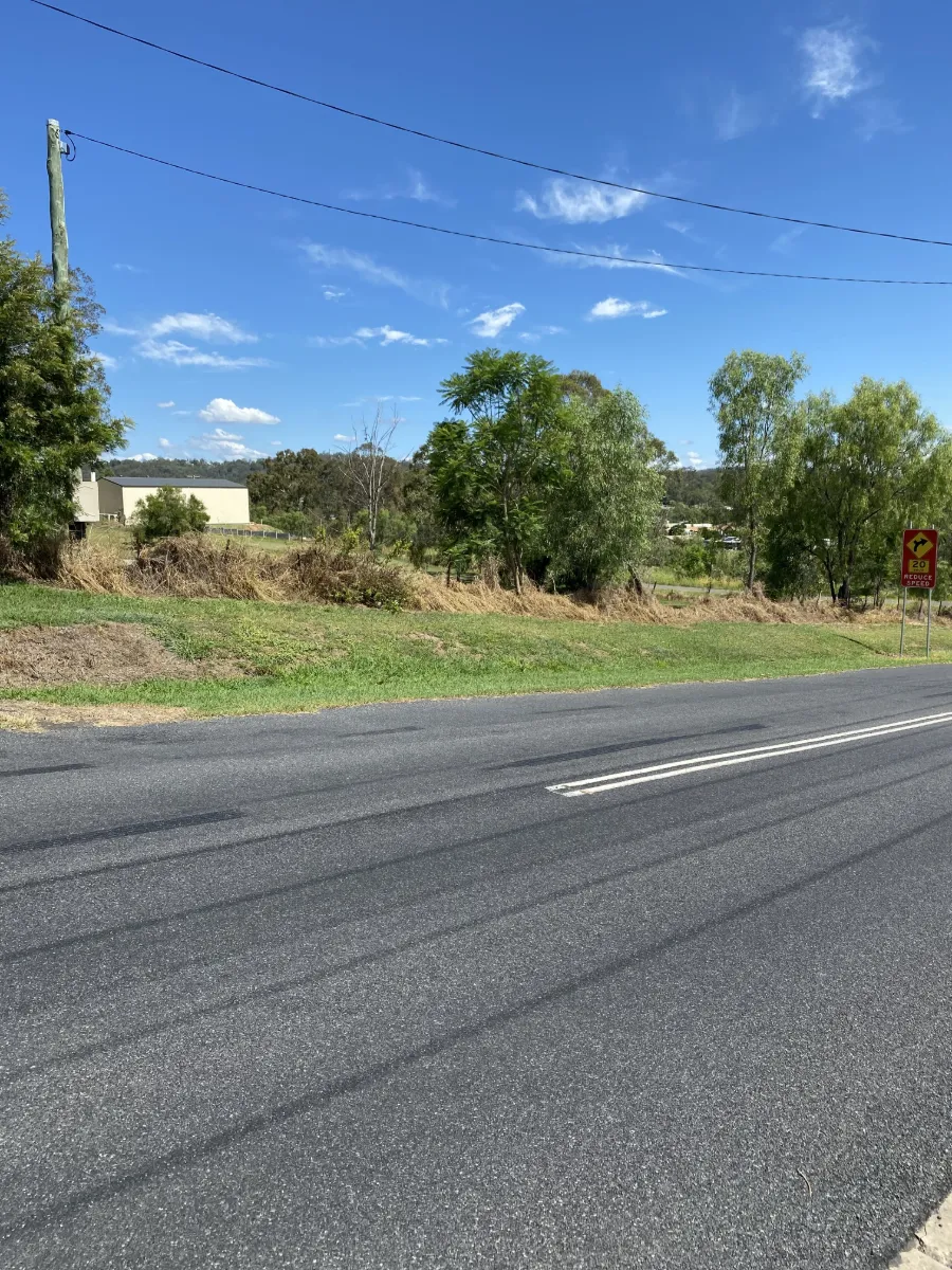 Roadside fence line sprayed out and knocked down along a boundary at Laidley QLD