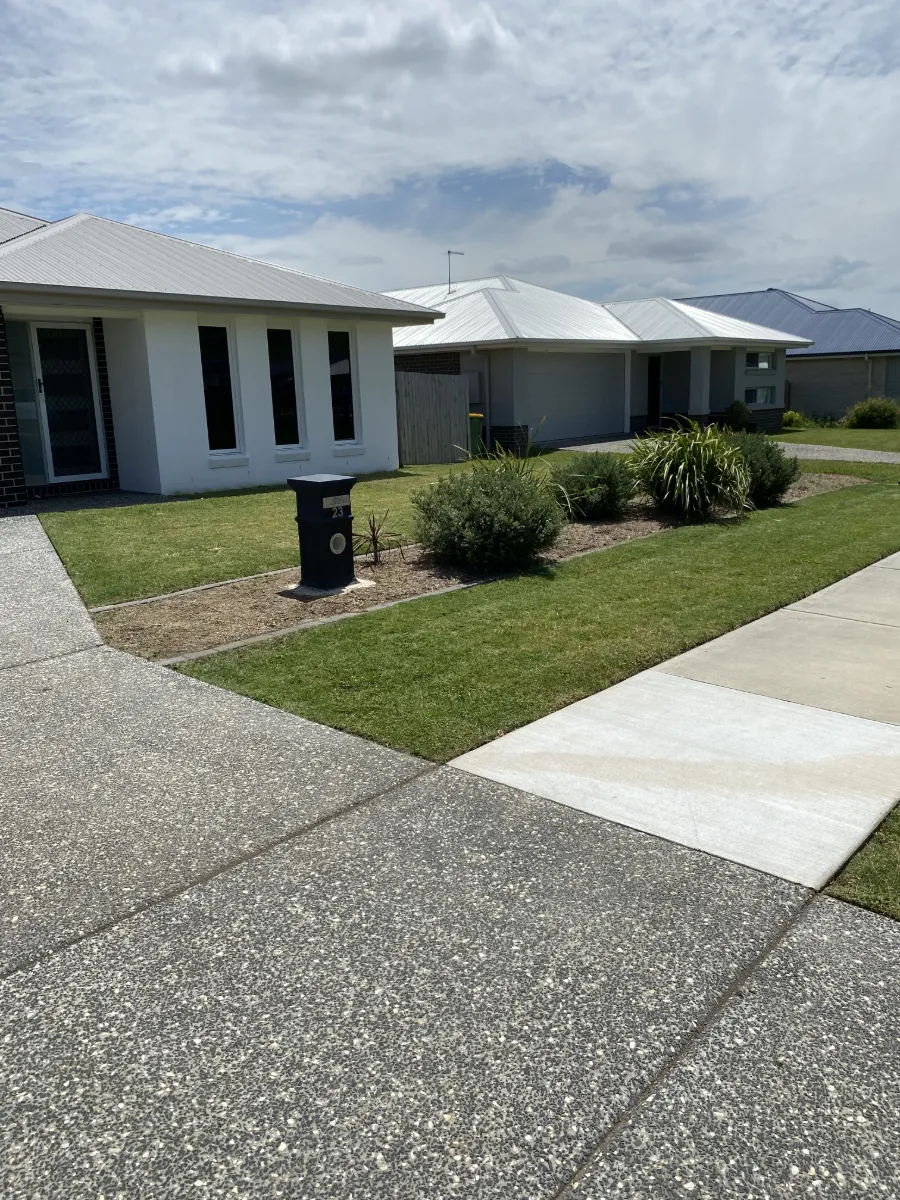 Front lawn mown and garden beds weeded and tidied at a Plainland property