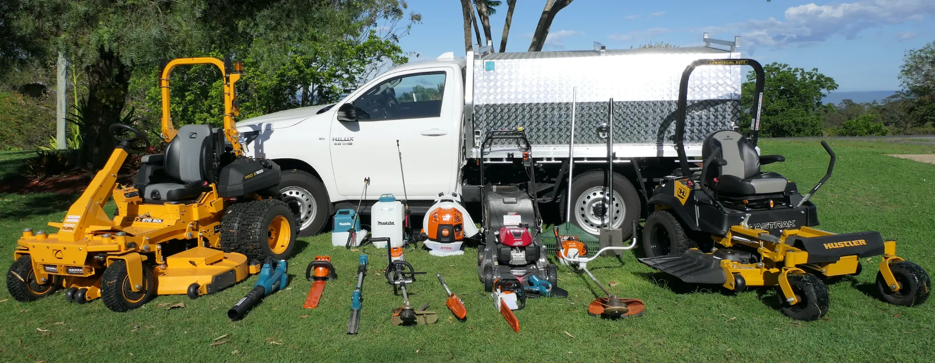 Callum's Mowing ride-on mowers, ute and equipment set up on a Lockyer Valley property