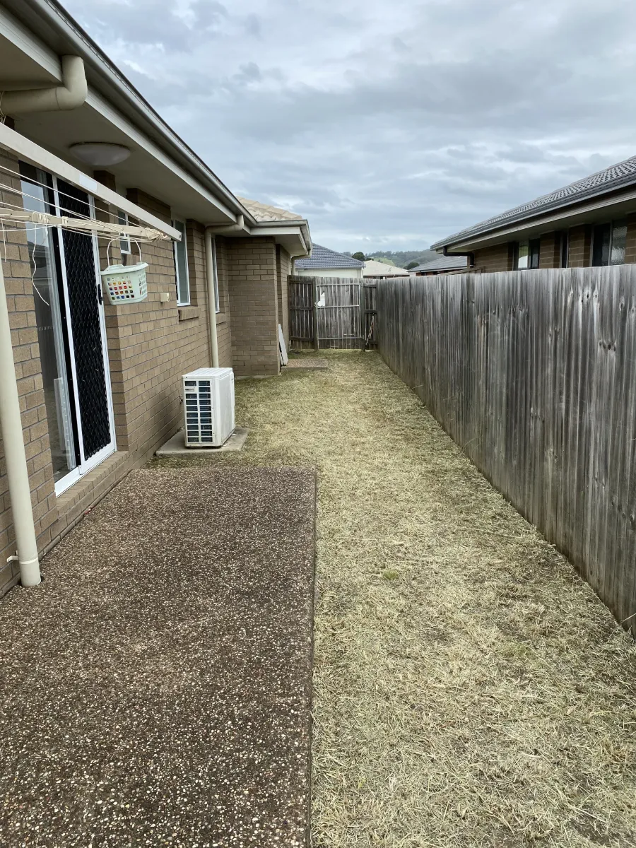 Side yard mown flat and cleaned up after an overgrown tidy-up at Laidley QLD