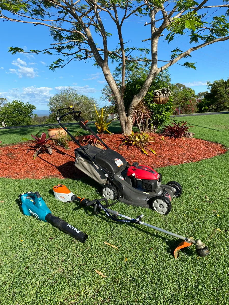Callum's Mowing Honda mower, Stihl whipper snipper and Makita blower on a freshly cut Lockyer Valley lawn